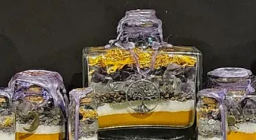 Good Health and Healing spell jars: purple-wrapped jars with orange and white layers